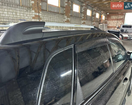 Чорний Хендай Туксон, об'ємом двигуна 2 л та пробігом 252 тис. км за 3000 $, фото 11 на Automoto.ua