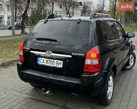 Черный Хендай Туксон, объемом двигателя 2 л и пробегом 242 тыс. км за 6999 $, фото 5 на Automoto.ua