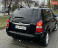 Черный Хендай Туксон, объемом двигателя 2 л и пробегом 242 тыс. км за 6999 $, фото 5 на Automoto.ua