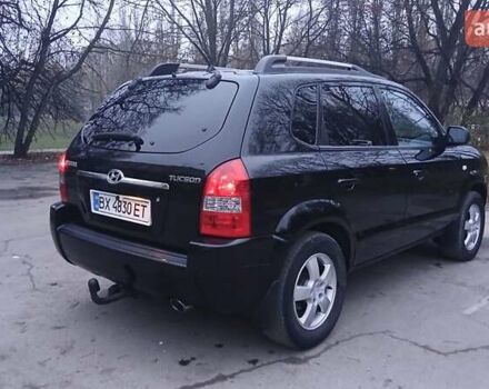 Черный Хендай Туксон, объемом двигателя 1.98 л и пробегом 320 тыс. км за 6300 $, фото 9 на Automoto.ua