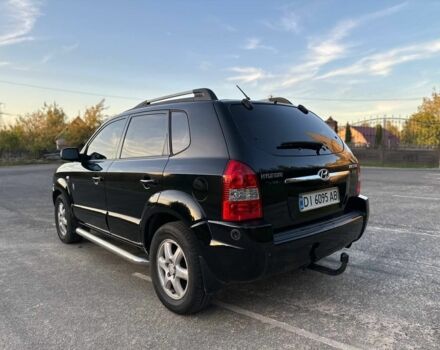 Чорний Хендай Туксон, об'ємом двигуна 2 л та пробігом 235 тис. км за 6700 $, фото 10 на Automoto.ua