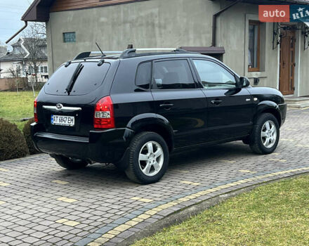Чорний Хендай Туксон, об'ємом двигуна 1.98 л та пробігом 185 тис. км за 6850 $, фото 4 на Automoto.ua