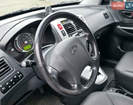 Чорний Хендай Туксон, об'ємом двигуна 1.98 л та пробігом 123 тис. км за 7950 $, фото 30 на Automoto.ua