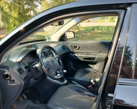 Черный Хендай Туксон, объемом двигателя 2 л и пробегом 180 тыс. км за 7600 $, фото 1 на Automoto.ua