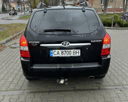 Черный Хендай Туксон, объемом двигателя 2 л и пробегом 242 тыс. км за 6999 $, фото 11 на Automoto.ua