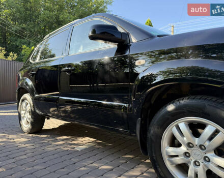 Черный Хендай Туксон, объемом двигателя 2 л и пробегом 192 тыс. км за 6950 $, фото 12 на Automoto.ua