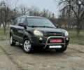 Черный Хендай Туксон, объемом двигателя 2 л и пробегом 201 тыс. км за 7750 $, фото 1 на Automoto.ua