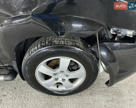 Чорний Хендай Туксон, об'ємом двигуна 2 л та пробігом 252 тис. км за 3000 $, фото 50 на Automoto.ua