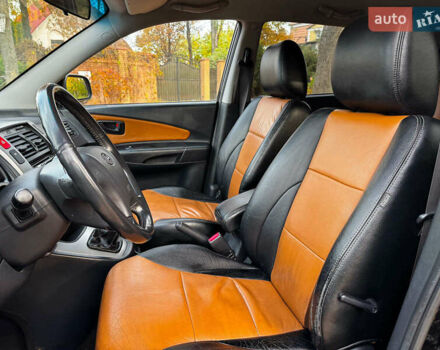 Черный Хендай Туксон, объемом двигателя 2 л и пробегом 210 тыс. км за 7990 $, фото 22 на Automoto.ua