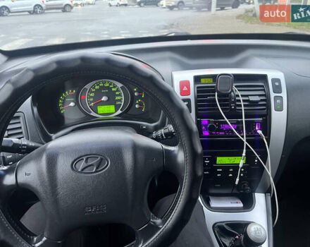 Черный Хендай Туксон, объемом двигателя 2 л и пробегом 242 тыс. км за 6999 $, фото 16 на Automoto.ua