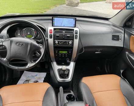 Черный Хендай Туксон, объемом двигателя 2 л и пробегом 216 тыс. км за 7500 $, фото 37 на Automoto.ua