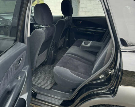 Черный Хендай Туксон, объемом двигателя 2 л и пробегом 201 тыс. км за 7750 $, фото 46 на Automoto.ua