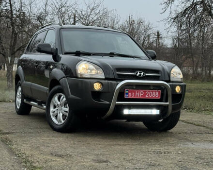 Черный Хендай Туксон, объемом двигателя 2 л и пробегом 201 тыс. км за 7750 $, фото 3 на Automoto.ua