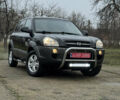 Черный Хендай Туксон, объемом двигателя 2 л и пробегом 201 тыс. км за 7750 $, фото 3 на Automoto.ua