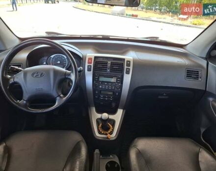 Чорний Хендай Туксон, об'ємом двигуна 1.98 л та пробігом 226 тис. км за 8800 $, фото 23 на Automoto.ua