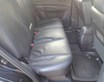 Черный Хендай Туксон, объемом двигателя 2 л и пробегом 203 тыс. км за 7500 $, фото 7 на Automoto.ua