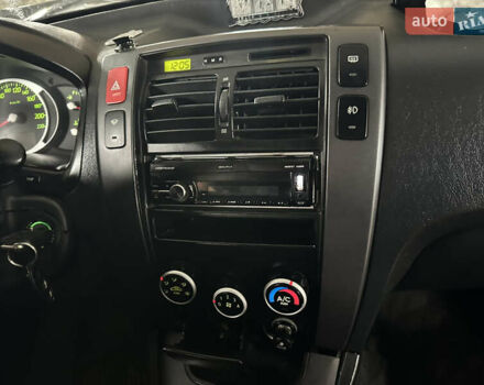 Чорний Хендай Туксон, об'ємом двигуна 2 л та пробігом 252 тис. км за 3000 $, фото 20 на Automoto.ua