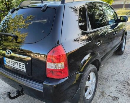 Черный Хендай Туксон, объемом двигателя 2 л и пробегом 206 тыс. км за 7500 $, фото 5 на Automoto.ua