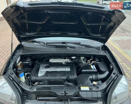 Черный Хендай Туксон, объемом двигателя 1.98 л и пробегом 227 тыс. км за 6900 $, фото 17 на Automoto.ua