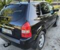 Черный Хендай Туксон, объемом двигателя 2 л и пробегом 206 тыс. км за 7500 $, фото 5 на Automoto.ua