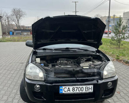 Черный Хендай Туксон, объемом двигателя 2 л и пробегом 242 тыс. км за 6999 $, фото 15 на Automoto.ua