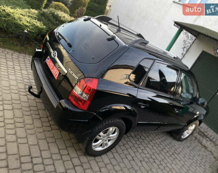 Чорний Хендай Туксон, об'ємом двигуна 1.98 л та пробігом 233 тис. км за 7650 $, фото 11 на Automoto.ua