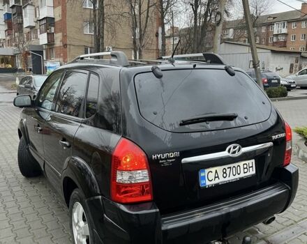 Черный Хендай Туксон, объемом двигателя 2 л и пробегом 242 тыс. км за 6999 $, фото 2 на Automoto.ua