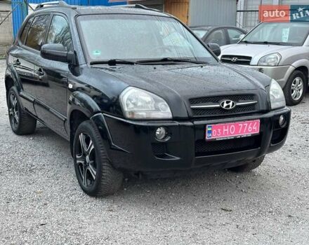 Чорний Хендай Туксон, об'ємом двигуна 2 л та пробігом 167 тис. км за 7950 $, фото 1 на Automoto.ua