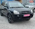 Чорний Хендай Туксон, об'ємом двигуна 2 л та пробігом 167 тис. км за 7950 $, фото 1 на Automoto.ua