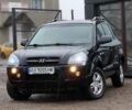 Черный Хендай Туксон, объемом двигателя 2 л и пробегом 263 тыс. км за 7950 $, фото 1 на Automoto.ua