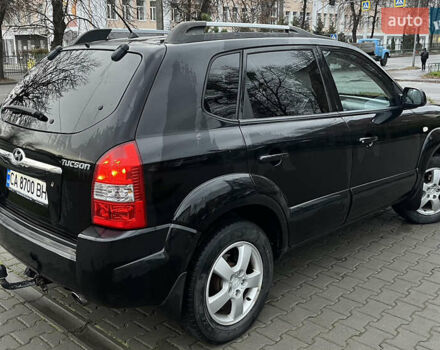 Черный Хендай Туксон, объемом двигателя 2 л и пробегом 242 тыс. км за 6999 $, фото 6 на Automoto.ua
