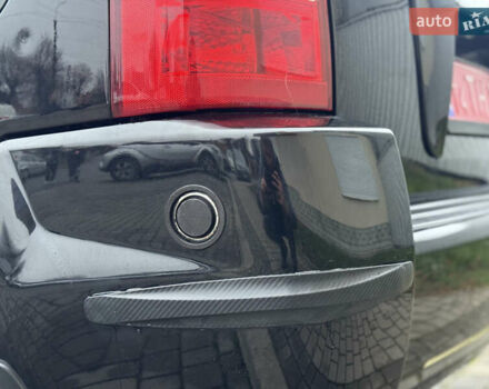 Черный Хендай Туксон, объемом двигателя 1.98 л и пробегом 231 тыс. км за 7750 $, фото 8 на Automoto.ua