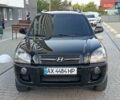 Чорний Хендай Туксон, об'ємом двигуна 2 л та пробігом 141 тис. км за 7999 $, фото 14 на Automoto.ua