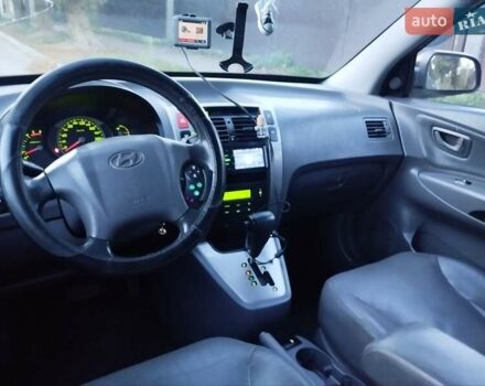 Чорний Хендай Туксон, об'ємом двигуна 1.99 л та пробігом 239 тис. км за 6990 $, фото 21 на Automoto.ua