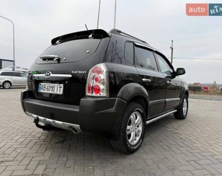 Чорний Хендай Туксон, об'ємом двигуна 2 л та пробігом 124 тис. км за 7950 $, фото 19 на Automoto.ua