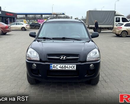 Черный Хендай Туксон, объемом двигателя 2 л и пробегом 200 тыс. км за 7800 $, фото 1 на Automoto.ua