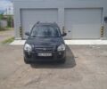 Черный Хендай Туксон, объемом двигателя 2 л и пробегом 220 тыс. км за 6700 $, фото 7 на Automoto.ua