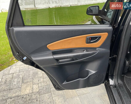 Черный Хендай Туксон, объемом двигателя 2 л и пробегом 216 тыс. км за 7500 $, фото 23 на Automoto.ua