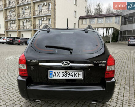 Черный Хендай Туксон, объемом двигателя 1.98 л и пробегом 250 тыс. км за 7150 $, фото 7 на Automoto.ua