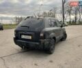 Чорний Хендай Туксон, об'ємом двигуна 2 л та пробігом 397 тис. км за 3900 $, фото 2 на Automoto.ua