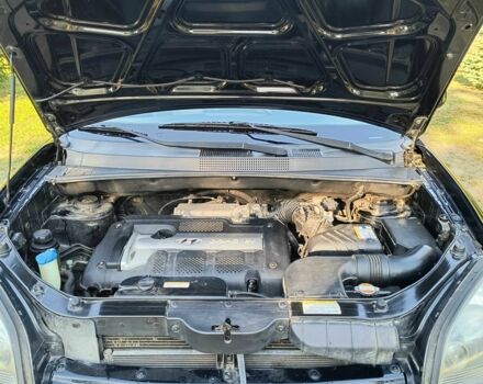 Черный Хендай Туксон, объемом двигателя 2 л и пробегом 206 тыс. км за 7500 $, фото 13 на Automoto.ua