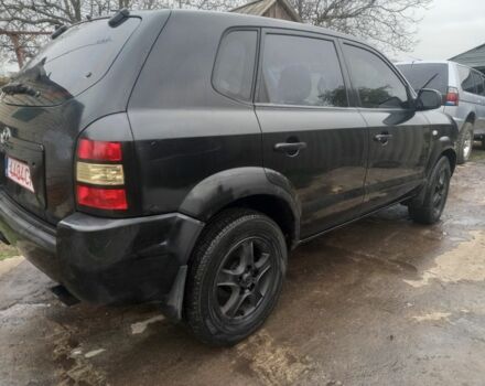 Черный Хендай Туксон, объемом двигателя 2 л и пробегом 395 тыс. км за 4500 $, фото 1 на Automoto.ua