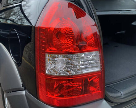 Черный Хендай Туксон, объемом двигателя 1.99 л и пробегом 186 тыс. км за 9400 $, фото 26 на Automoto.ua