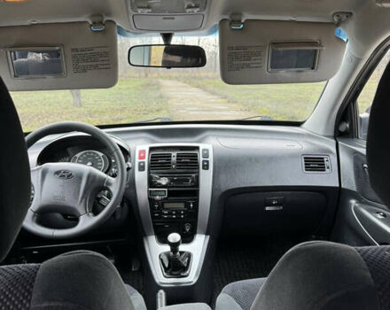 Черный Хендай Туксон, объемом двигателя 2 л и пробегом 201 тыс. км за 7750 $, фото 44 на Automoto.ua