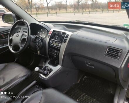 Черный Хендай Туксон, объемом двигателя 2 л и пробегом 237 тыс. км за 7999 $, фото 36 на Automoto.ua