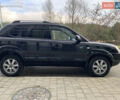 Черный Хендай Туксон, объемом двигателя 1.99 л и пробегом 290 тыс. км за 7700 $, фото 1 на Automoto.ua