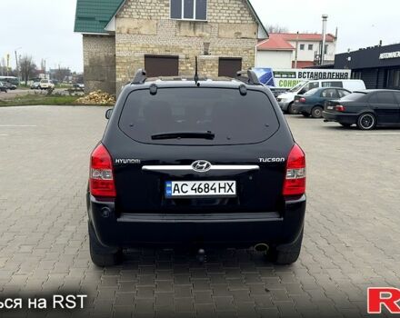 Черный Хендай Туксон, объемом двигателя 2 л и пробегом 200 тыс. км за 7800 $, фото 5 на Automoto.ua