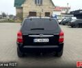 Черный Хендай Туксон, объемом двигателя 2 л и пробегом 200 тыс. км за 7800 $, фото 5 на Automoto.ua
