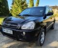Черный Хендай Туксон, объемом двигателя 2 л и пробегом 206 тыс. км за 7500 $, фото 1 на Automoto.ua