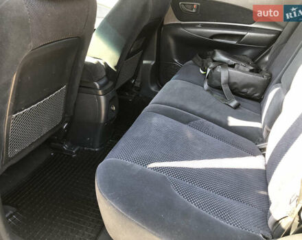 Чорний Хендай Туксон, об'ємом двигуна 1.99 л та пробігом 338 тис. км за 7800 $, фото 8 на Automoto.ua